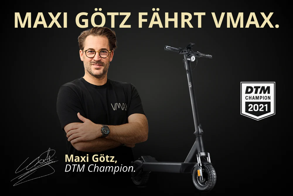 Rennsport DTM Champion Max Götz fährt VMAX E Scooter